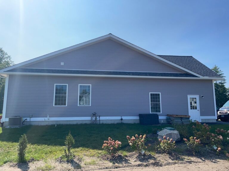 Vinyl siding installation repairing storm damage in Merrimack NH, Hillsborough County by experienced Merrimack siding contractor
