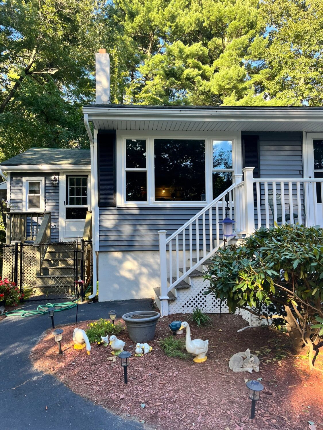 Front view of a Pelham NH home featuring energy-efficient window replacement in Pelham by Coastal Windows & Exteriors.