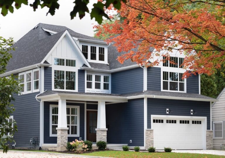 Energy-efficient Peterborough siding replacement with insulated panels by Coastal Windows & Exteriors.