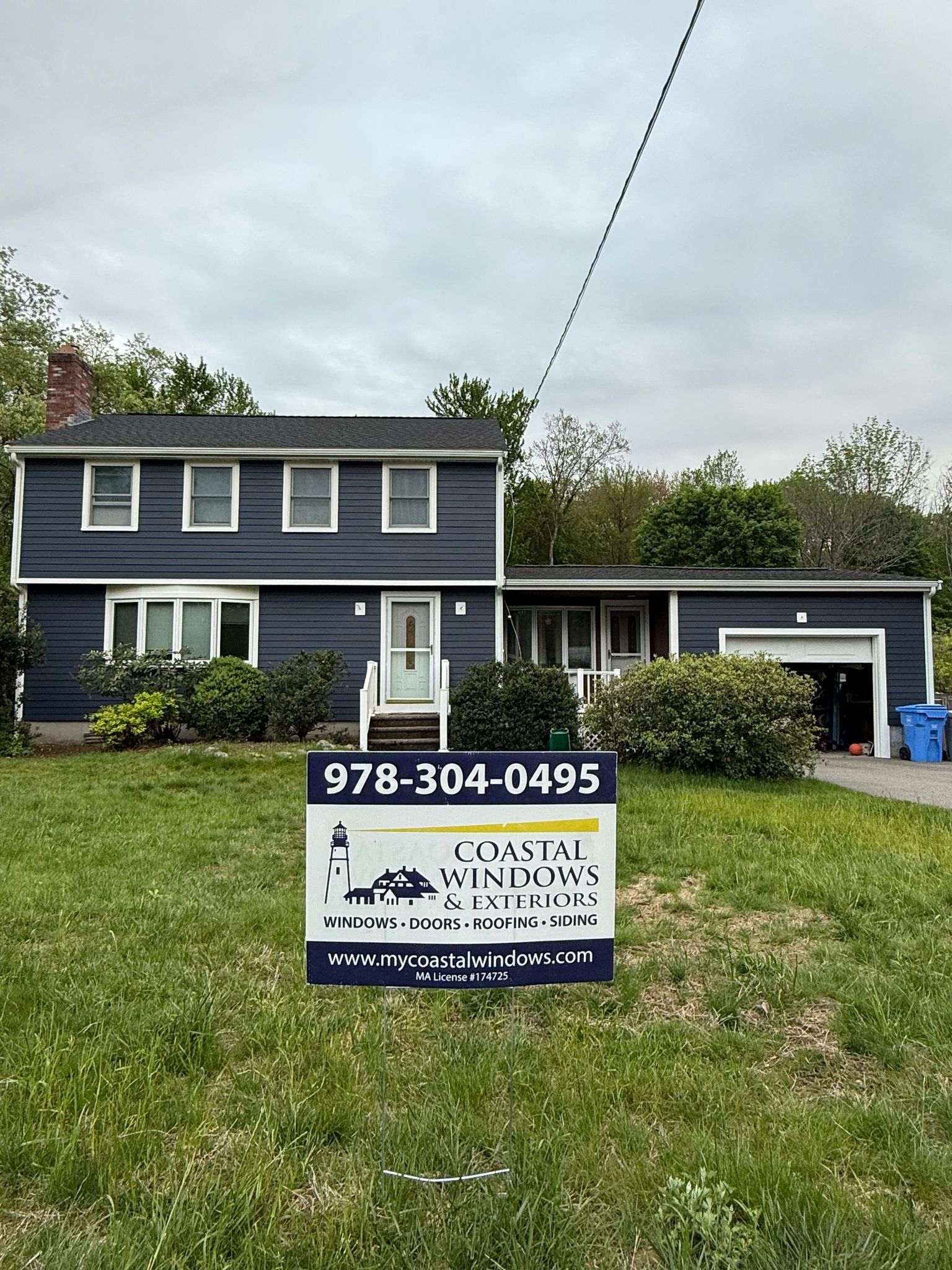 Holliston MA home featuring James Hardie siding installed by Coastal Windows & Exteriors.