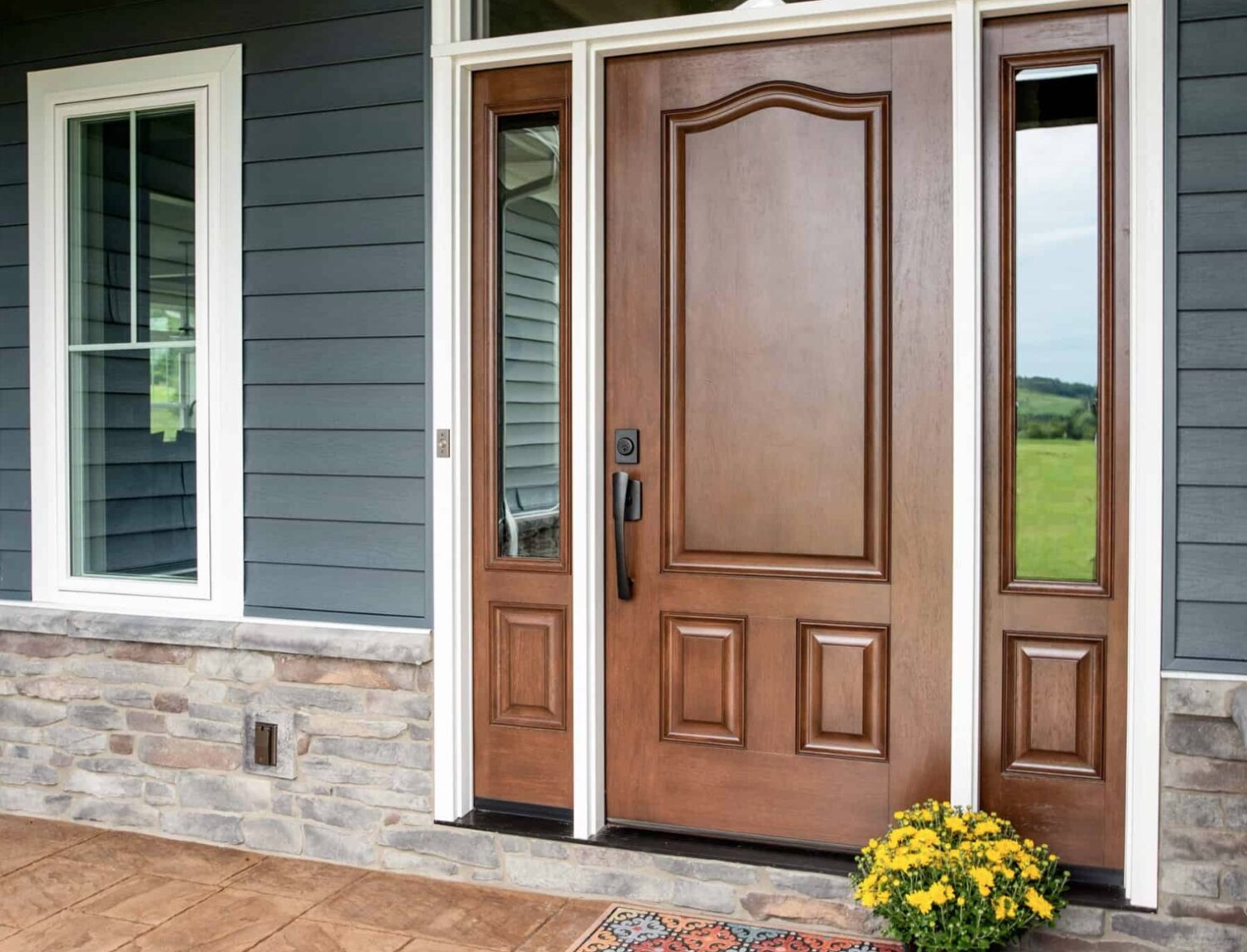 Secure and stylish front door replacement Hancock NH featuring an upgraded, enhanced-security entry door.