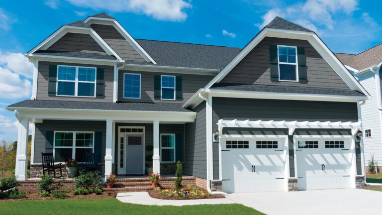 This home received siding replacement from a vinyl siding contractor Greenfield NH to resolve water damage issues.