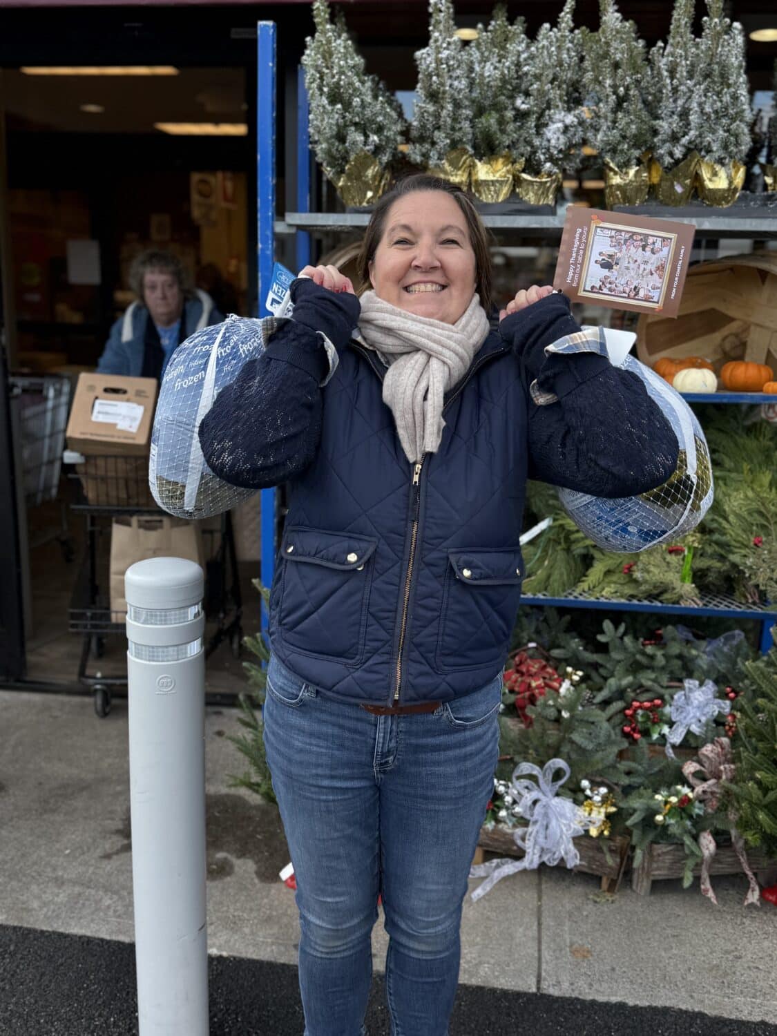 Stephanie Vanderbilt delivering turkey donations in Gloucester MA
