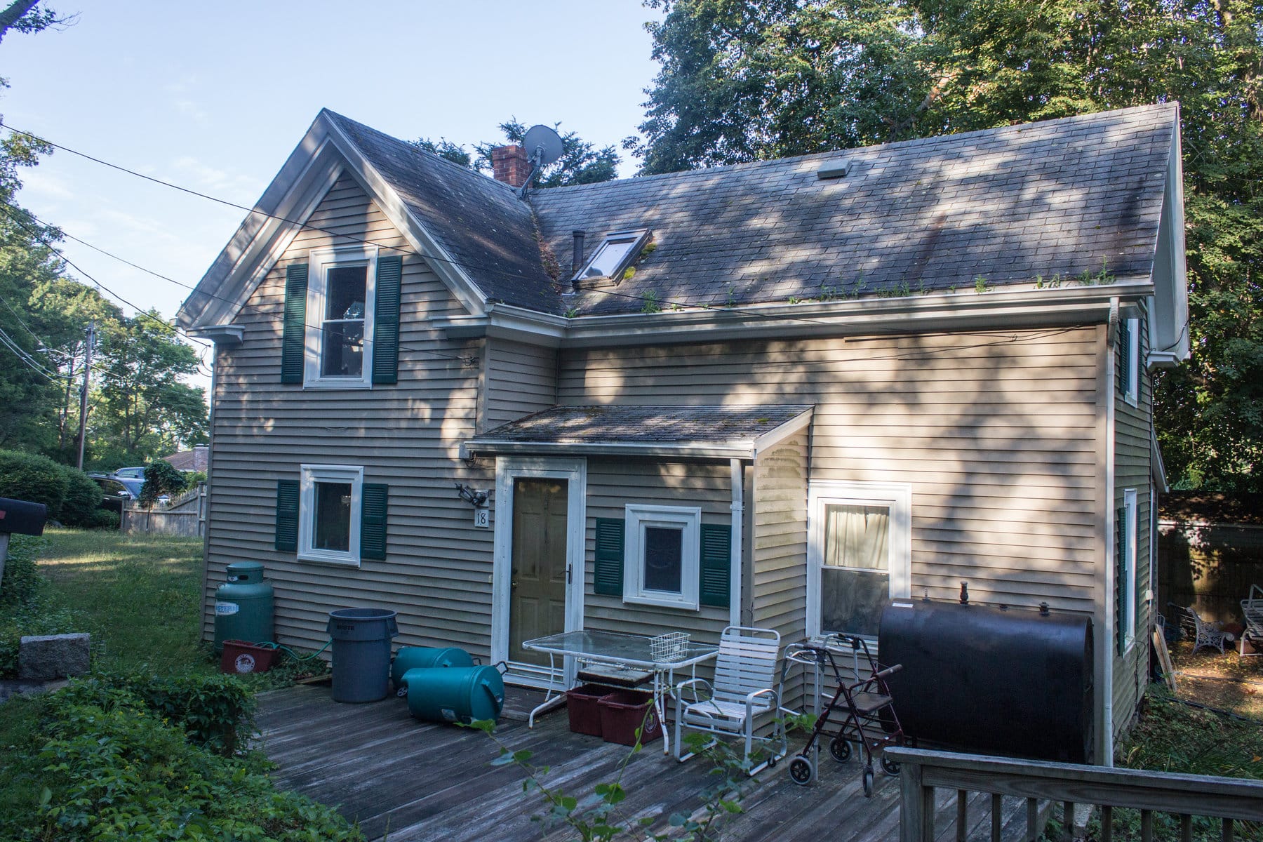Home exterior before renovation during an Exterior remodeling sale project in Beverly MA North Shore.