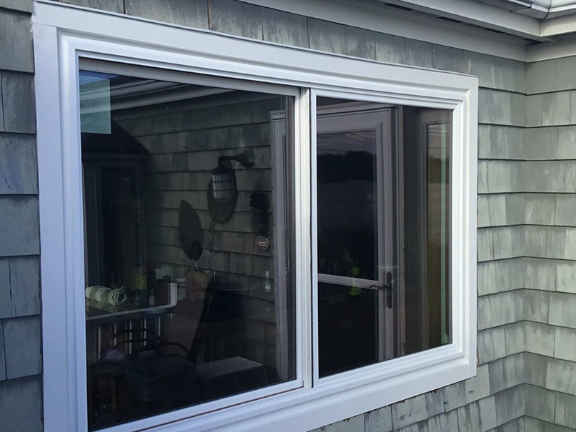 Newly installed energy efficient windows after renovation during an Exterior remodeling sale in Beverly MA North Shore.