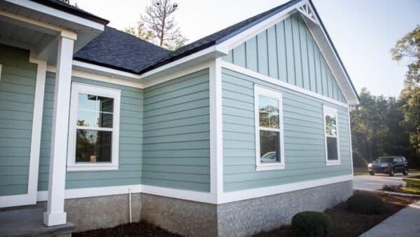 vinyl siding contractors Chestnut Hill MA upgrading siding with insulation and trim for energy efficiency.