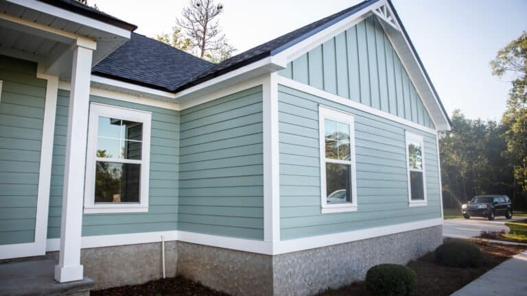 vinyl siding contractors Chestnut Hill MA upgrading siding with insulation and trim for energy efficiency.