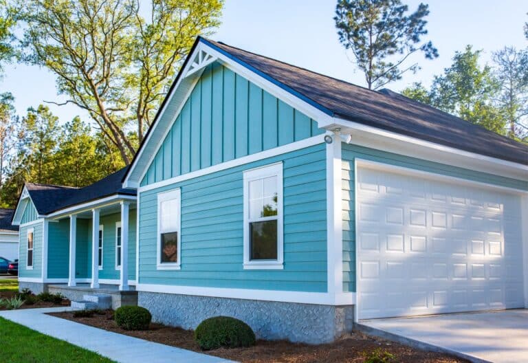 coastal home upgraded by james hardie siding contractor Cohasset MA featuring durable fiber cement siding and trim.