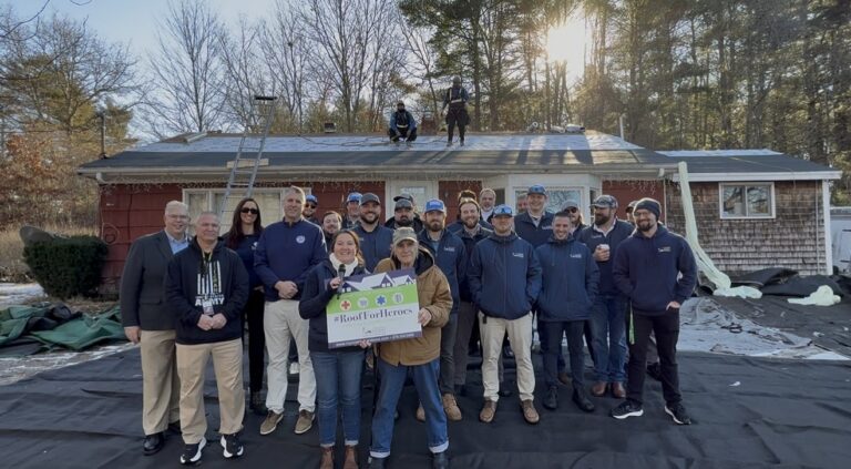 roofing in new hampshire crew working on roof installation in Concord NH during Roof for Heroes project.