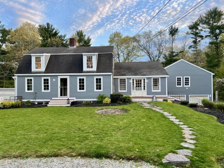 classic home exterior transformed by low maintenance siding through James Hardie siding installation in Franklin MA with clean lines and durability
