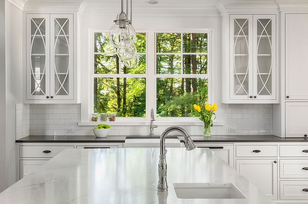 bright kitchen featuring modern upgrades with window replacement in Franklin MA improving natural light and energy efficiency