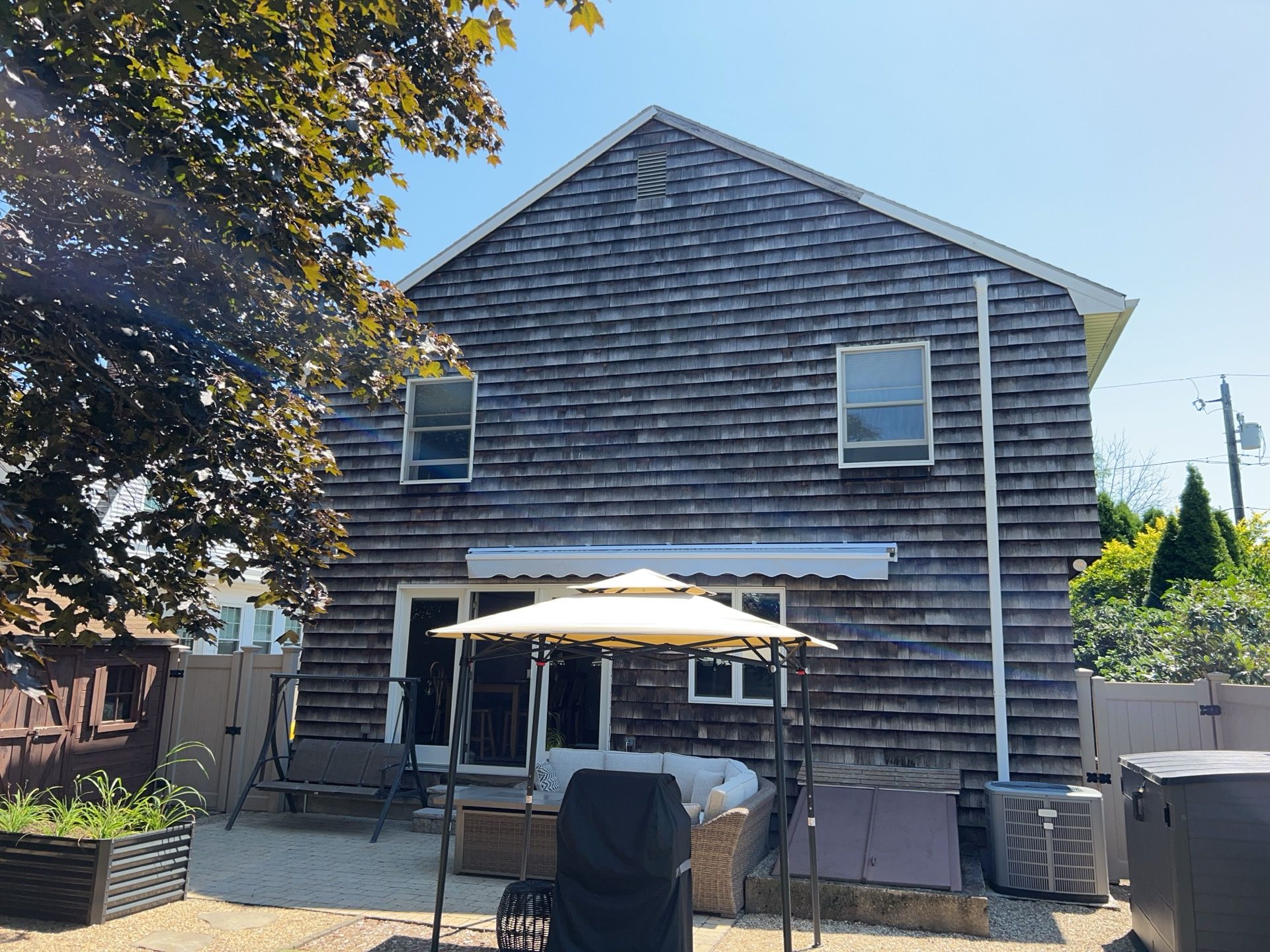 Home exterior before new vinyl siding installation