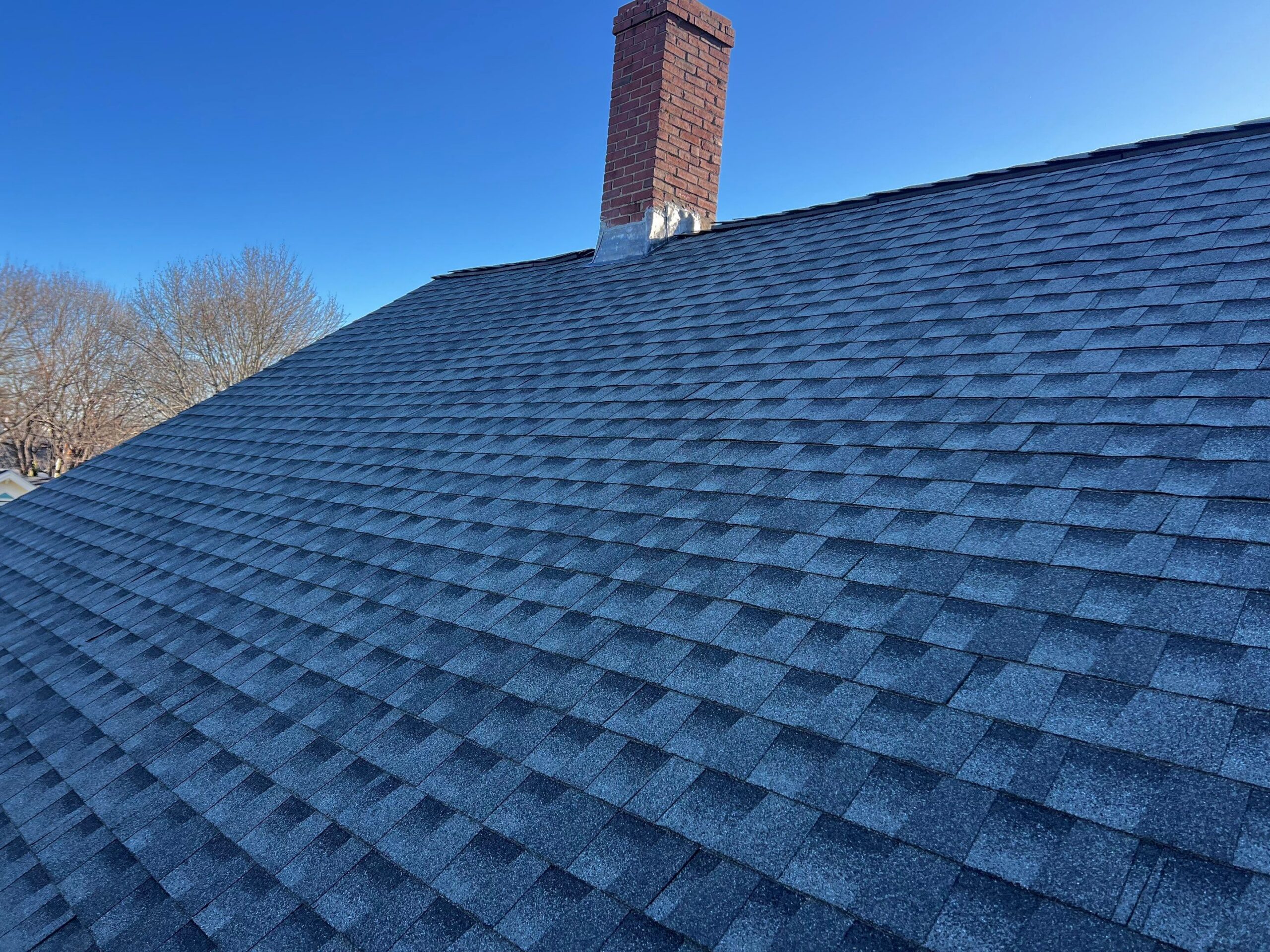 Newly installed roof after replacement by Coastal Windows & Exteriors