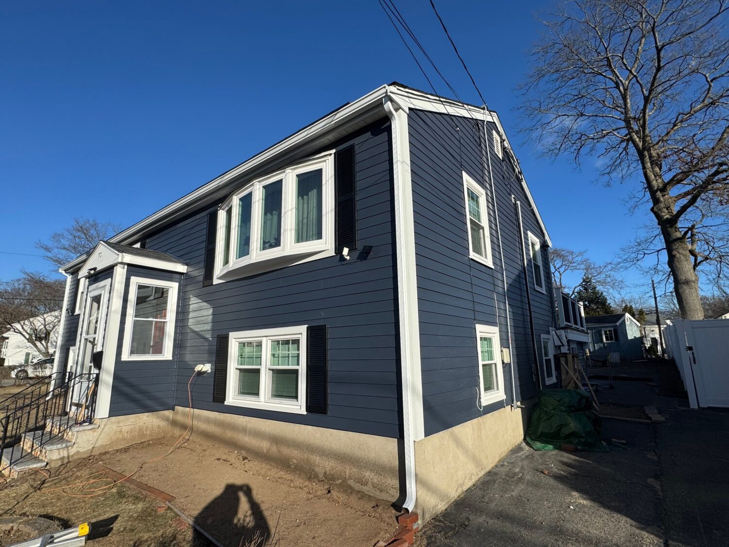 Siding replacement protecting against water damage in Winthrop, Greater Boston by Coastal Windows & Exteriors.